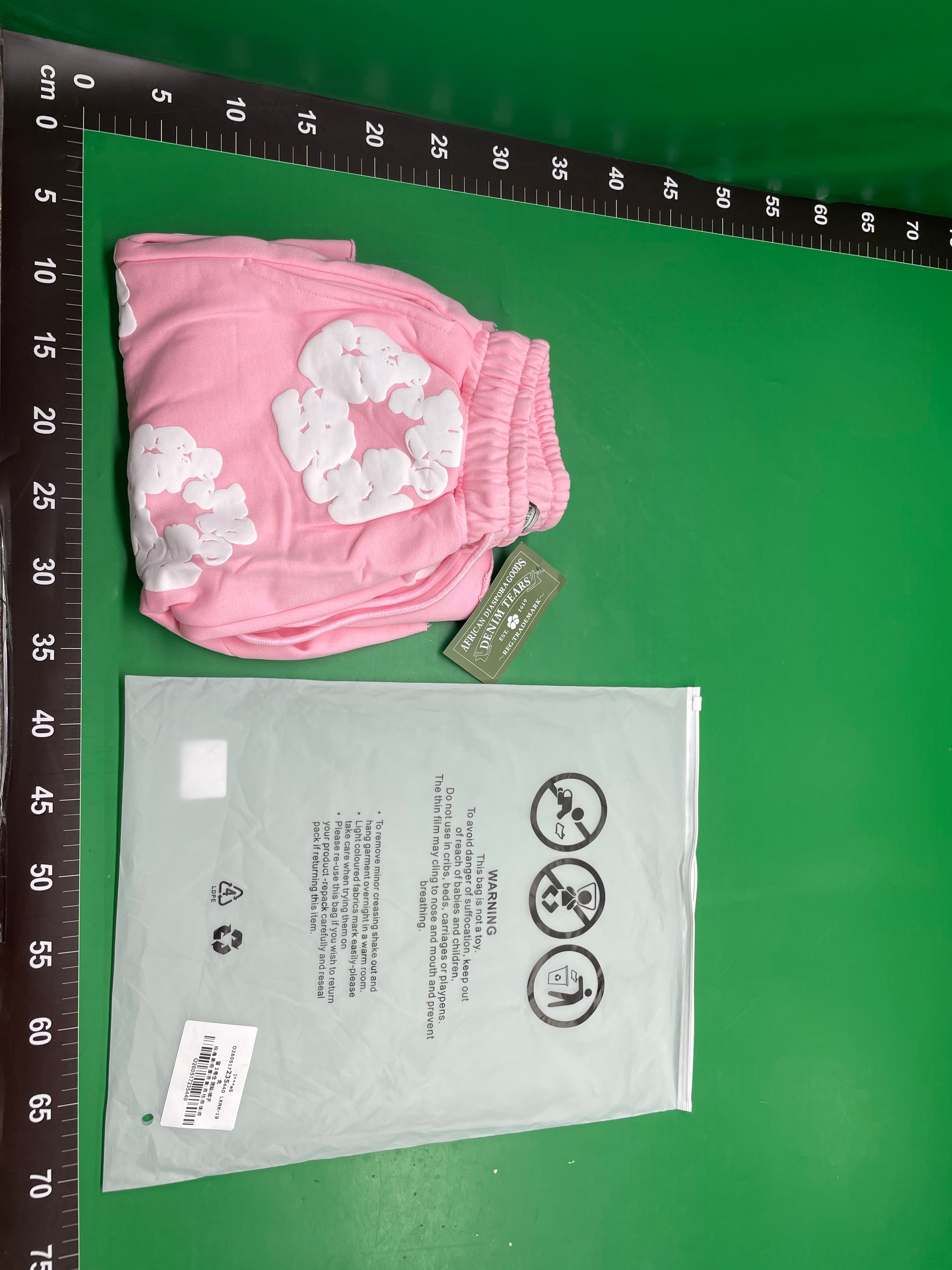 外贸批发木棉花发泡印花美潮宽松男女款短袖T恤休闲短裤套装 — foto QC 1