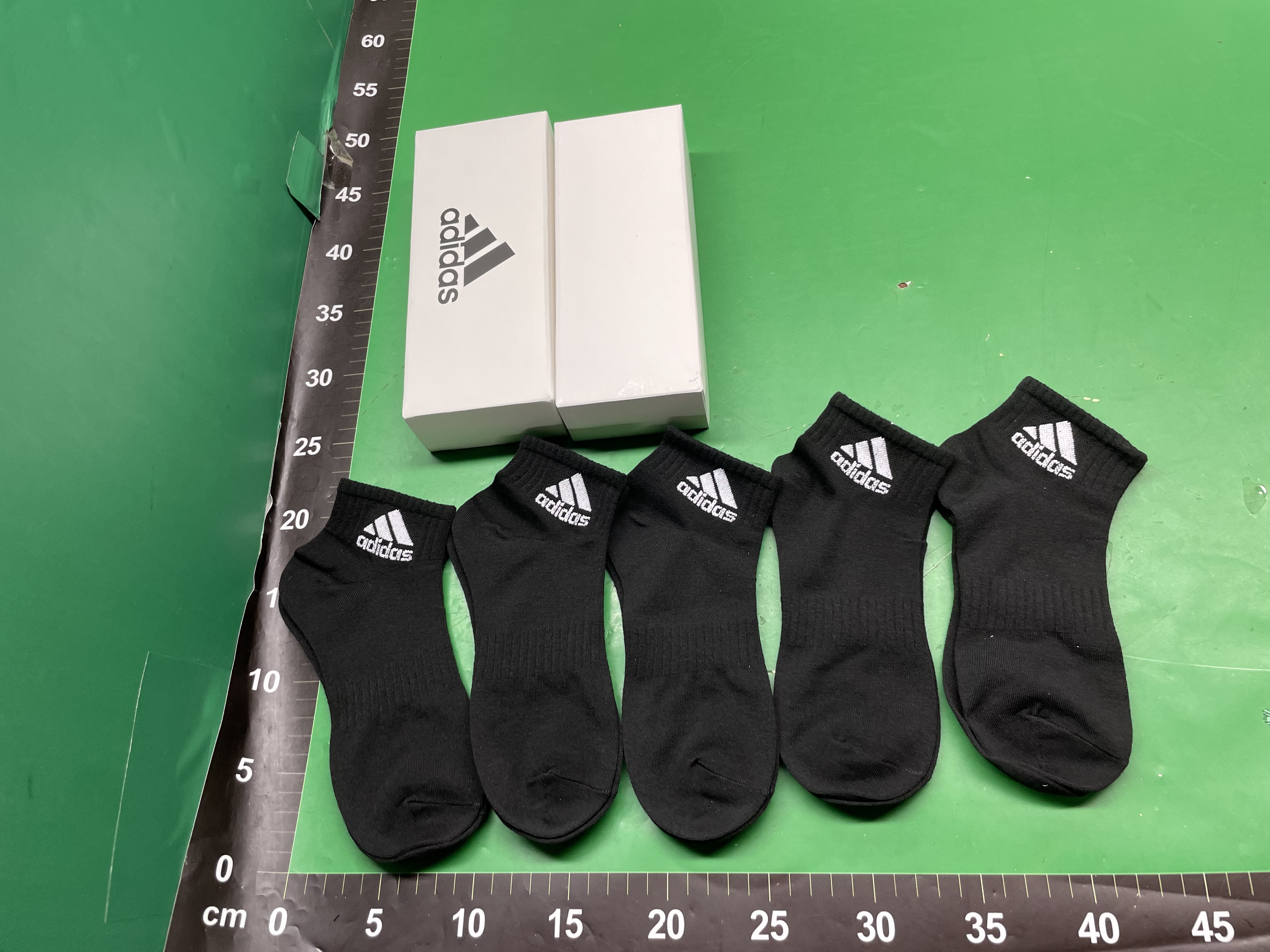 批发冠家迪袜子黑白灰盒装棉男女袜中高筒跑步运动袜一件代发吸汗 — foto QC 1
