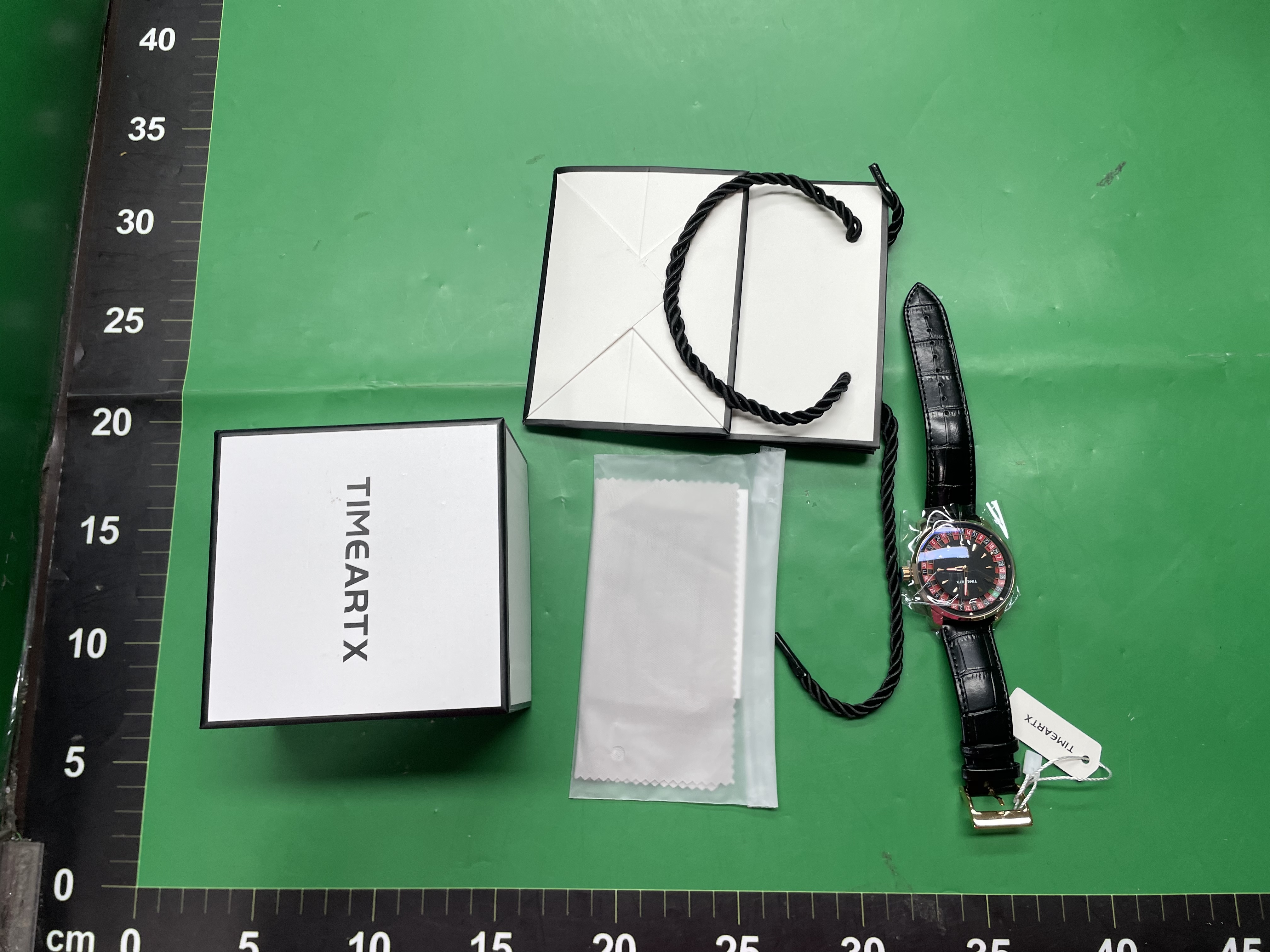赌场轮盘旋转男士手表个性夜光防水皮带钢带跨境石英腕表送盒子 — foto QC 1