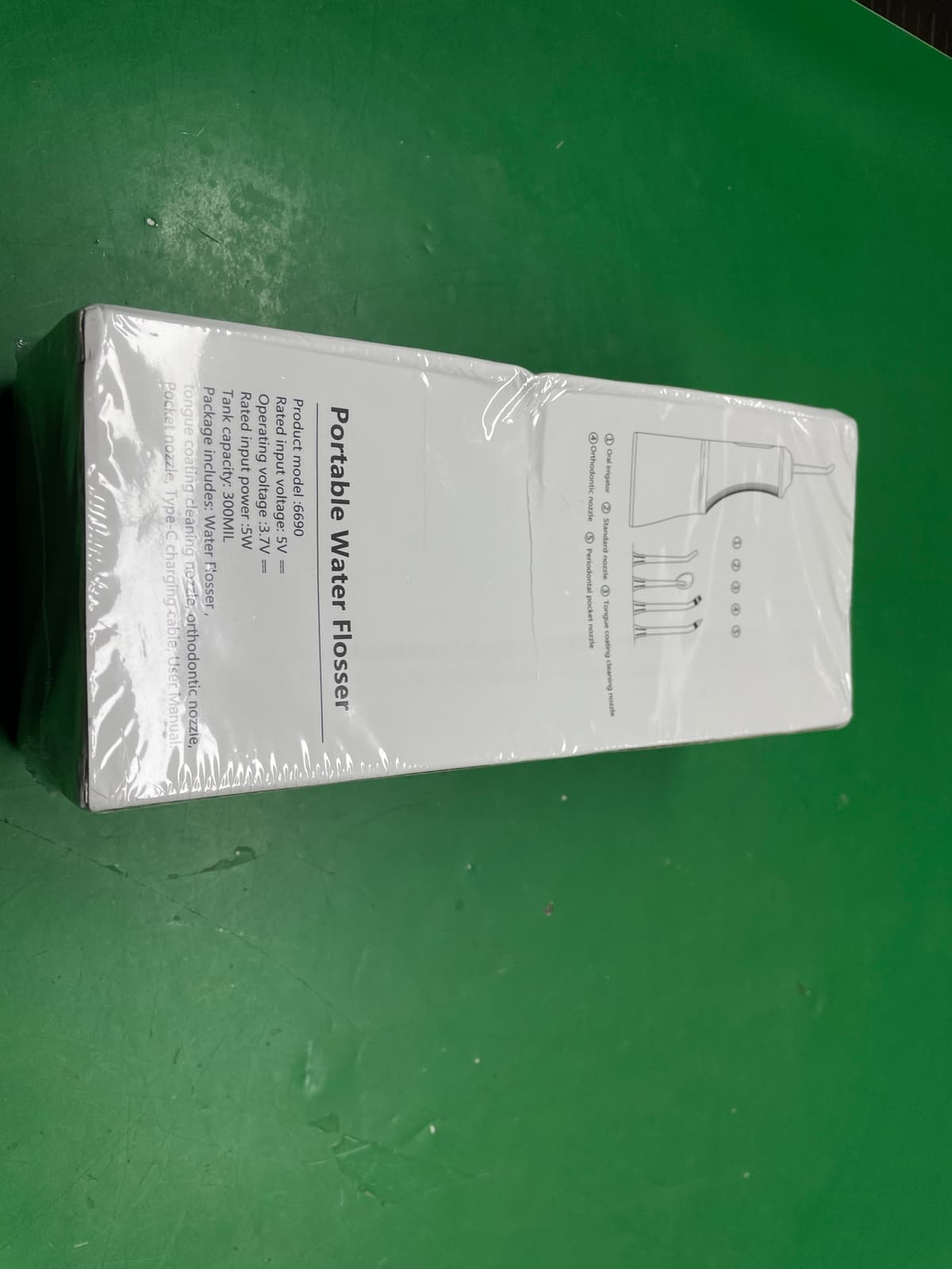 跨境电动便携冲牙器成人口腔清洁洗牙器去结石冲洗器洗牙机水牙线 — foto QC 1
