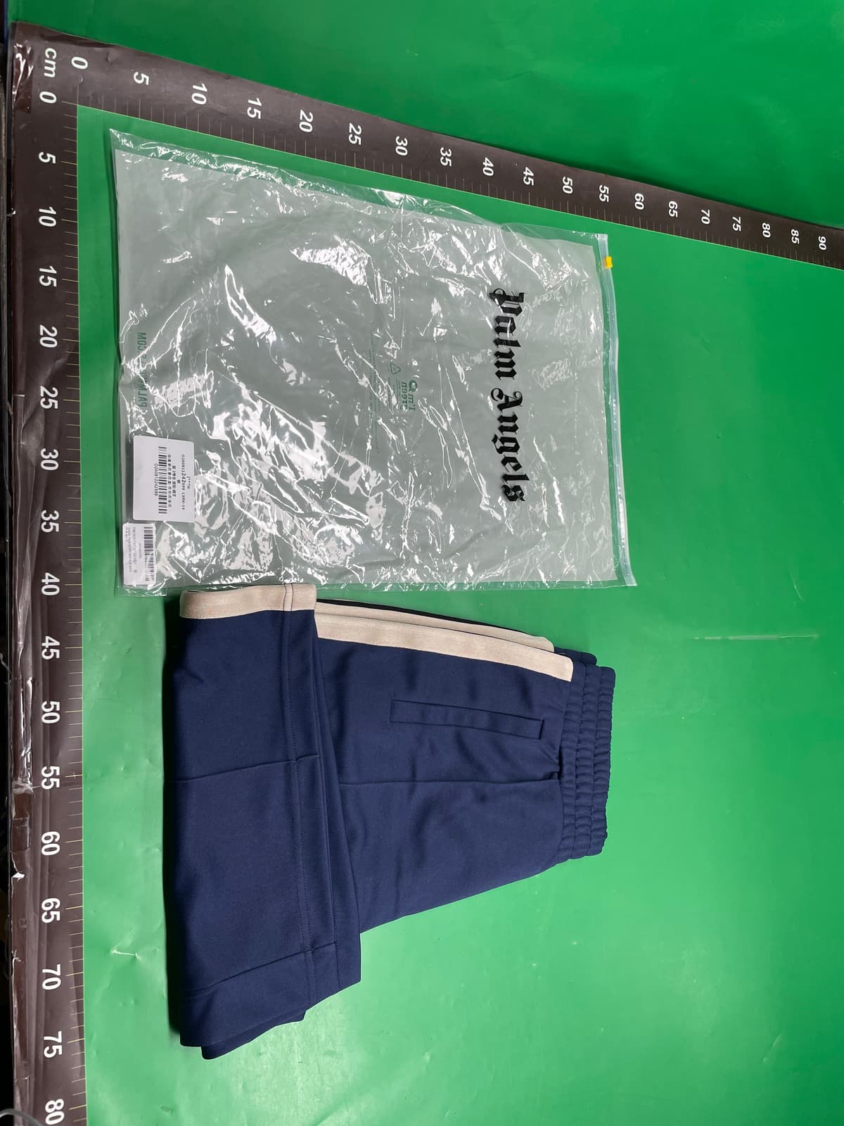track shorts — foto QC 1