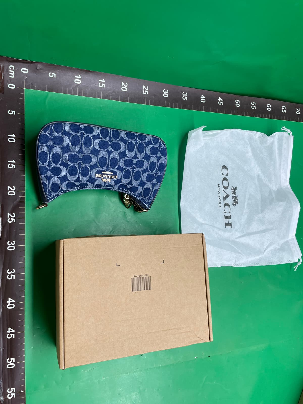 蔻家高版本teri冰川白腋下包手提复古老花百搭斜挎
单肩包女 — foto QC 1