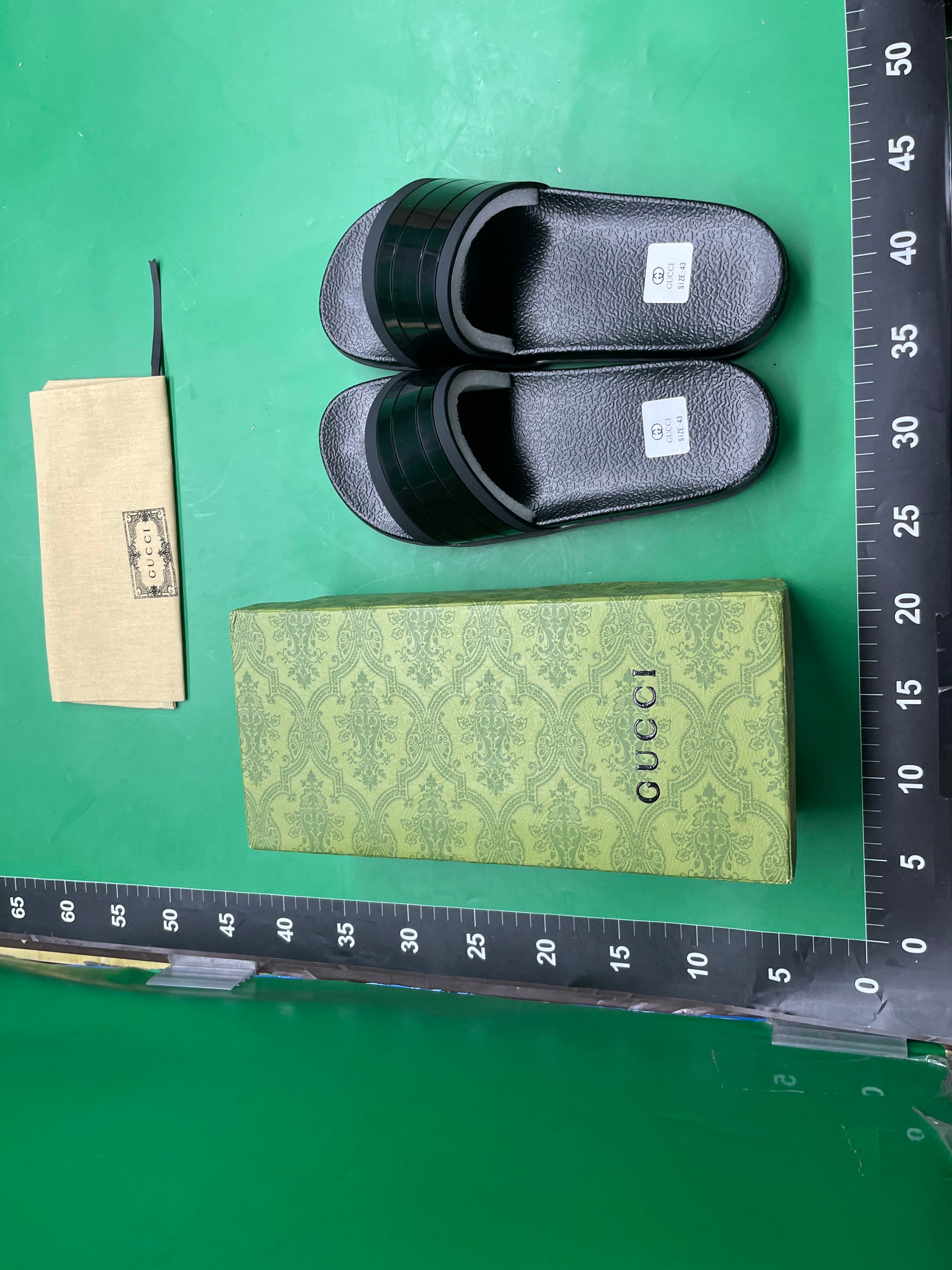 越南柬埔寨比利时高档男士橡胶拖鞋夏季新款潮牌G字母厚底一字拖 — foto QC 1