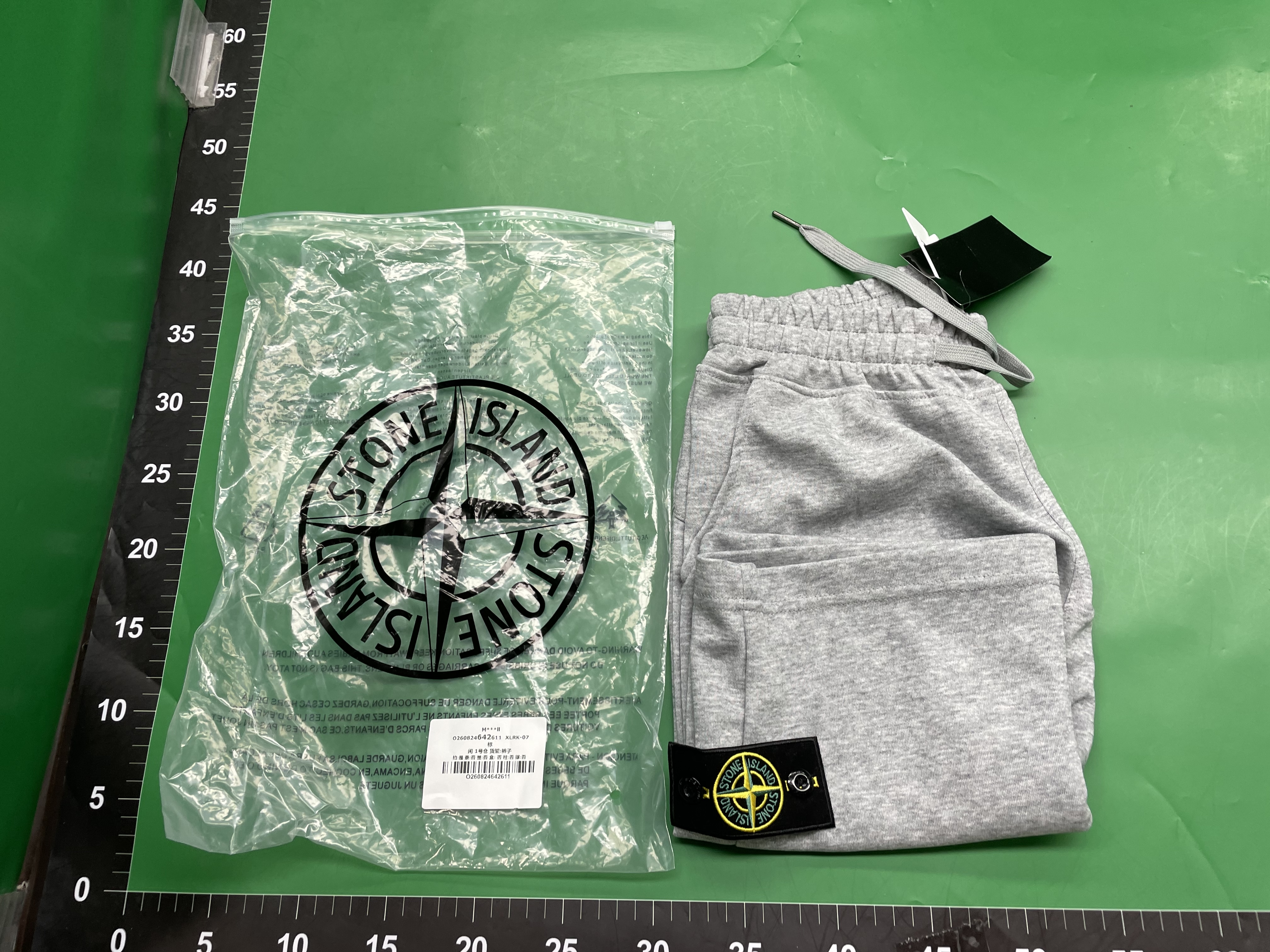 正确跨境STLAND石头休闲纯色新款刺绣徽章纯棉短裤运动五分裤宽松 — foto QC 1