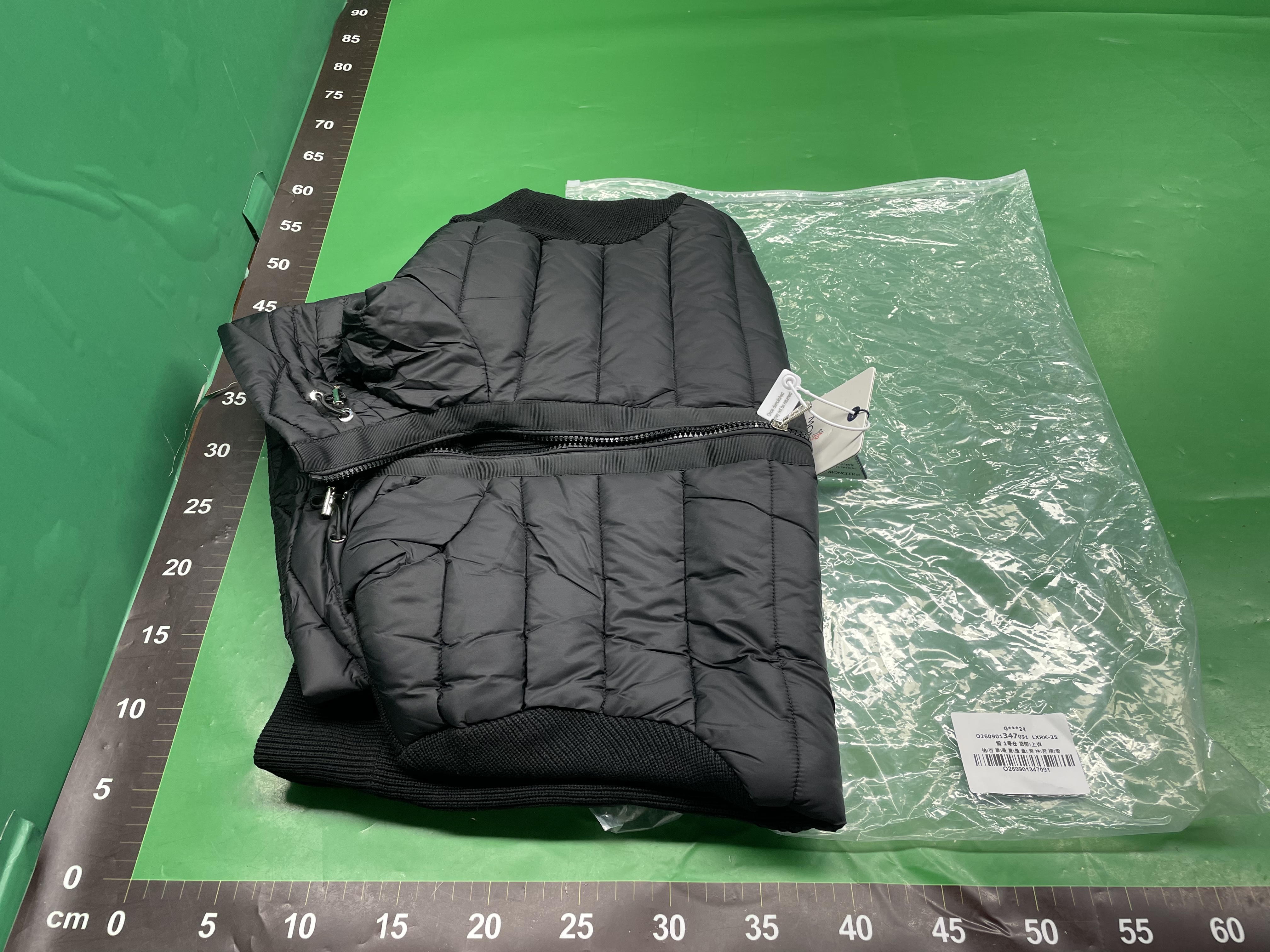 外贸欧洲站新款M家针织拼接羽绒服 现货立领休闲时尚男女同款外套 — miniatura QC 4