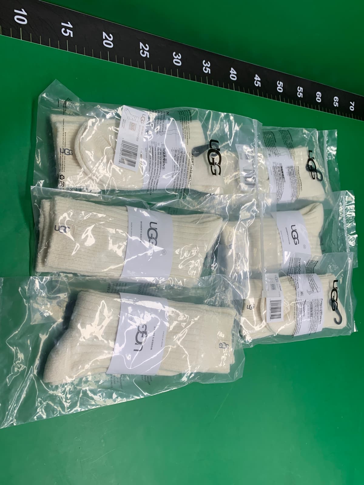 潮牌大线ug女士堆堆布标纯色袜子秋冬保暖休闲款批发女袜加厚 — foto QC 1
