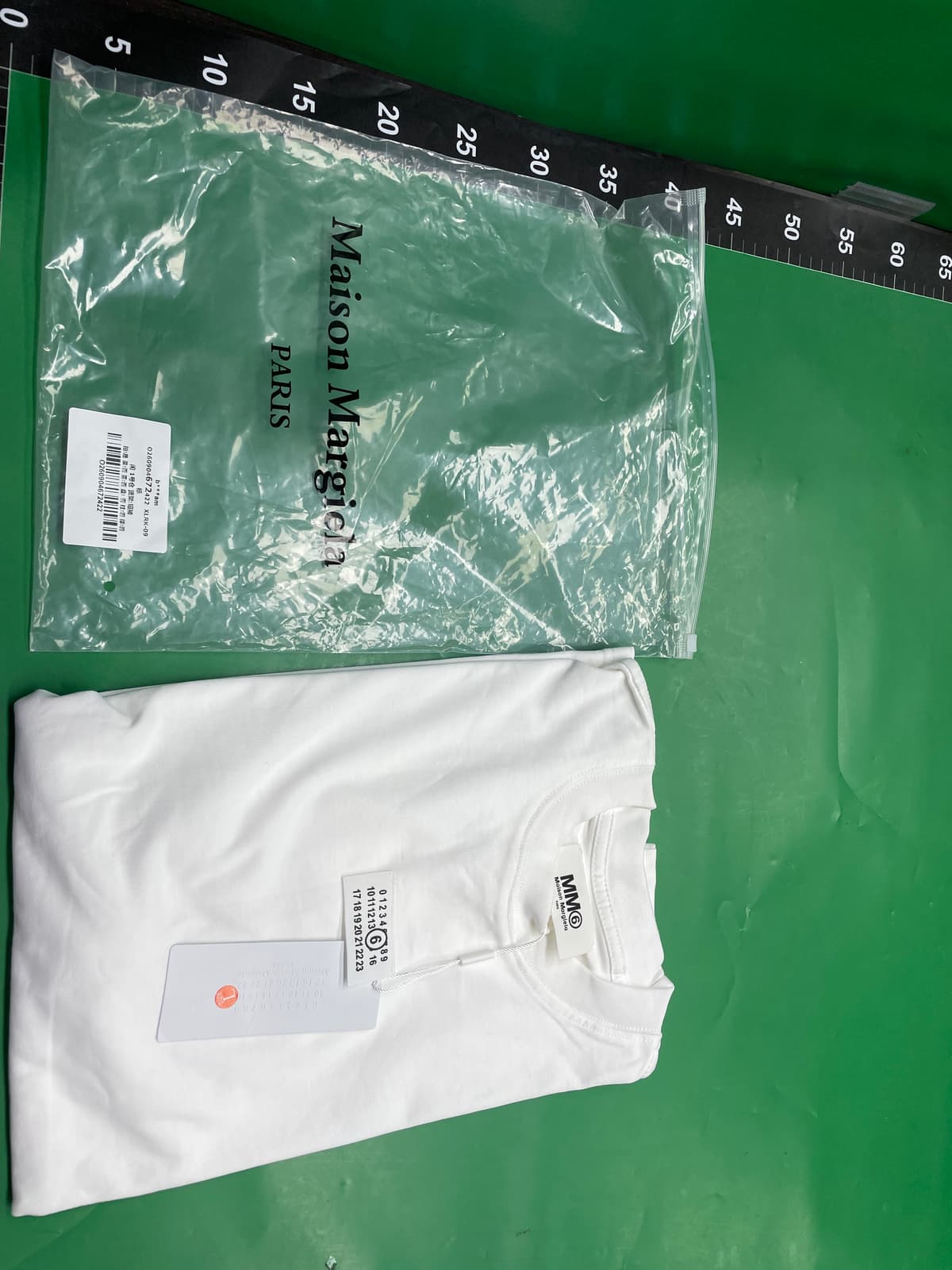 26SS新款三标齐全跨境潮牌M6烫钻印胶刺绣高品男女同款简约短袖集 — foto QC 1